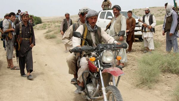 This photograph taken on August 1, 2015, shows members of Afghanistan's militia forces gathering in the Qala-e Zal district of Kunduz province - Sputnik International