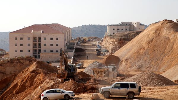 A construction site is seen in the Israeli settlement of Beitar Ilit, in the occupied West Bank December 22, 2016 - Sputnik International