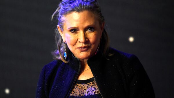 FILE PHOTO: Carrie Fisher poses for cameras as she arrives at the European Premiere of Star Wars, The Force Awakens in Leicester Square, London, December 16, 2015 - Sputnik International