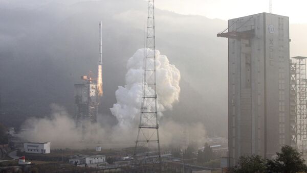 In this photo released by China's Xinhua news agency, China's third geostationary meteorological satellite, the Fengyun-2-06, is launched on a Long March-3A carrier rocket at the Xichang Satellite Launch Center in southwest China's Sichuan Province, China - Sputnik International