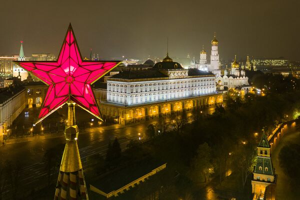 The star atop the Vodovzvodnaya Tower of the Moscow Kremlin. Right: the Grand Kremlin Palace, and the Church of St. John Climacus the Ivan the Great Bell Tower The star atop the Vodovzvodnaya Tower of the Moscow Kremlin. Right: the Grand Kremlin Palace, and the Church of St. John Climacus the Ivan the Great Bell Tower - Sputnik International
