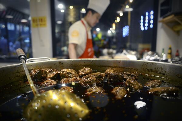 This picture taken on September 8, 2016 shows prepared rabbit heads at a restaurant in Chengdu, in southwestern China's Sichuan province - Sputnik International