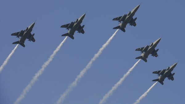 Indian Air Force jet fighters fly over India Gate as part of the Republic Day Parade rehearsal, on January 21, 2011 - Sputnik International