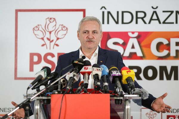 Leader of Romania's leftist Social Democratic Party (PSD) Liviu Dragnea gestures during a news conference following the end of the parliamentary elections, in Bucharest, Romania December 11, 2016 Leader of Romania's leftist Social Democratic Party (PSD) Liviu Dragnea gestures during a news conference following the end of the parliamentary elections, in Bucharest, Romania December 11, 2016 - Sputnik International