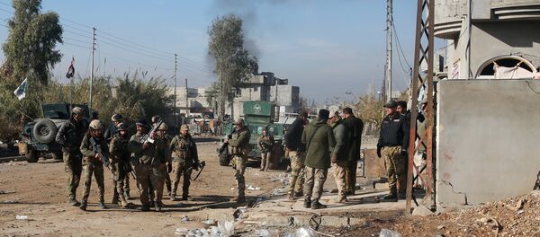 Iraqi rapid response forces gather during a fight with Islamic State militants in Intisar district of eastern Mosul, Iraq, December 22, 2016 - Sputnik International