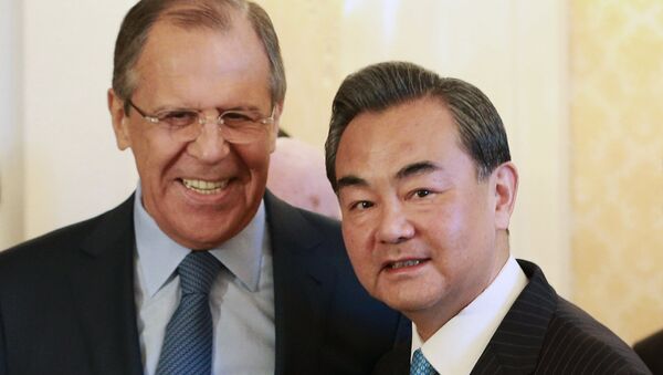 Russian FM Sergey Lavrov meets Chinese FM Wang Yi - Sputnik International