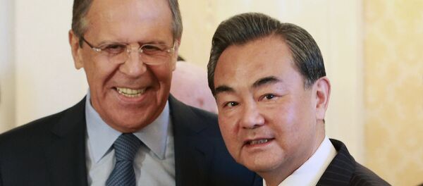 Russian FM Sergey Lavrov meets Chinese FM Wang Yi Russian FM Sergey Lavrov meets Chinese FM Wang Yi - Sputnik International