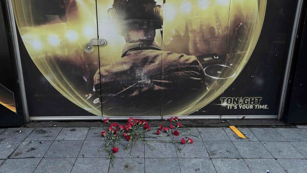 Flowers are placed outisde the Reina nightclub by the Bosphorus, which was attacked by a gunman, in Istanbul, Turkey, January 1, 2017. - Sputnik International