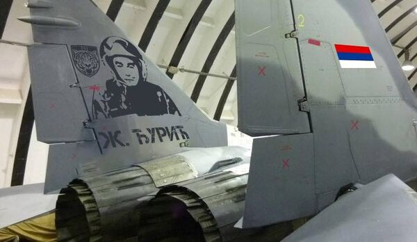 Russian MIGs with Serbian pilots painted on them Russian MIGs with Serbian pilots painted on them - Sputnik International