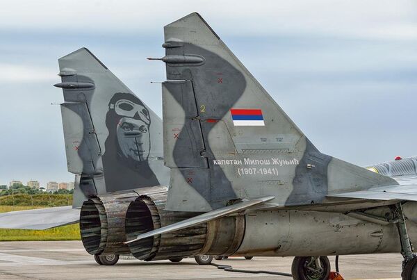Russian MIGs with Serbian pilots painted on them Russian MIGs with Serbian pilots painted on them - Sputnik International