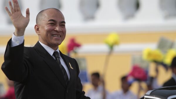 Cambodia's King Norodom Sihamoni greets well-wishers during an Independence Day celebration in front of Royal Palace in Phnom Penh, Cambodia, Saturday, Nov. 9, 2013. The King attended the celebration to mark the country's 60th Independence Day from France. - Sputnik International