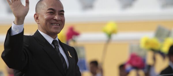 Cambodia's King Norodom Sihamoni greets well-wishers during an Independence Day celebration in front of Royal Palace in Phnom Penh, Cambodia, Saturday, Nov. 9, 2013. The King attended the celebration to mark the country's 60th Independence Day from France. Cambodia's King Norodom Sihamoni greets well-wishers during an Independence Day celebration in front of Royal Palace in Phnom Penh, Cambodia, Saturday, Nov. 9, 2013. The King attended the celebration to mark the country's 60th Independence Day from France. - Sputnik International