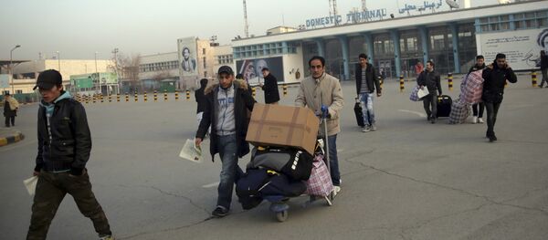 Afghans who were deported from Germany exit the Kabul International Airport, Kabul, Afghanistan, Thursday, Dec. 15, 2016 Afghans who were deported from Germany exit the Kabul International Airport, Kabul, Afghanistan, Thursday, Dec. 15, 2016 - Sputnik International