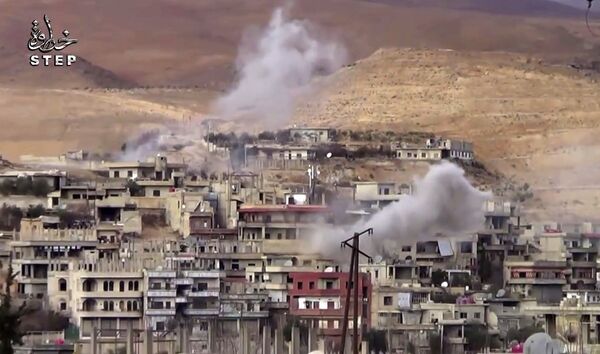 This frame grab from video provided By Step News Agency, a Syrian opposition media outlet that is consistent with independent AP reporting, shows smoke rise from the alleged government forces shelling on Wadi Barada, northwest of Damascus, Syria This frame grab from video provided By Step News Agency, a Syrian opposition media outlet that is consistent with independent AP reporting, shows smoke rise from the alleged government forces shelling on Wadi Barada, northwest of Damascus, Syria - Sputnik International