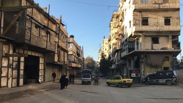 Residents in al-Midan neighborhood in Syria's Aleppo - Sputnik International