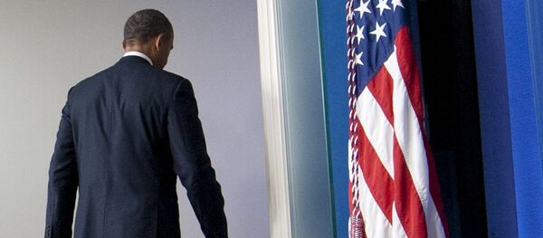 US President Barack Obama leaves after speaking about the possible government shutdown during a budget showdown with Congress in the Brady Press Briefing Room of the White House in Washington, DC, September 30, 2013 US President Barack Obama leaves after speaking about the possible government shutdown during a budget showdown with Congress in the Brady Press Briefing Room of the White House in Washington, DC, September 30, 2013 - Sputnik International