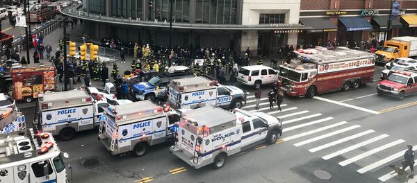Emergency vehicles gather at the Atlantic Avenue Terminal after a commuter train derailed during the Wednesday morning commute, in New York, U.S., January 4, 2017 - Sputnik International