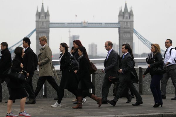 Workers walk across London Bridge on their way to the City of London, October, 2012 Workers walk across London Bridge on their way to the City of London, October, 2012 - Sputnik International