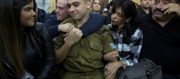 Israeli soldier Elor Azaria, who is charged with manslaughter by the Israeli military, sits to hear his verdict in a military court in Tel Aviv, Israel, January 4, 2017 Israeli soldier Elor Azaria, who is charged with manslaughter by the Israeli military, sits to hear his verdict in a military court in Tel Aviv, Israel, January 4, 2017 - Sputnik International