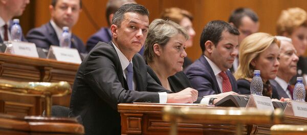 Sorin Grindeanu, Romania's designated Prime Minister, looks towards press representatives in the Romanian Parliament, in Bucharest, Romania, January 4, 2017 Sorin Grindeanu, Romania's designated Prime Minister, looks towards press representatives in the Romanian Parliament, in Bucharest, Romania, January 4, 2017 - Sputnik International