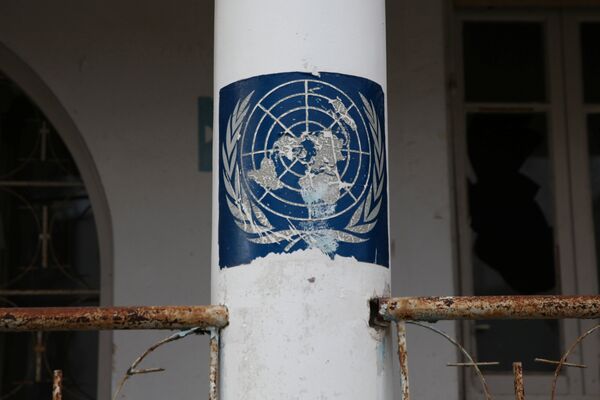 A UN sign is seen inside the UN-controlled buffer zone during a guided media tour in Nicosia, Cyprus January 4, 2017. A UN sign is seen inside the UN-controlled buffer zone during a guided media tour in Nicosia, Cyprus January 4, 2017. - Sputnik International