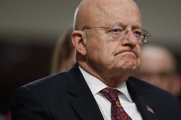 Director of National Intelligence James Clapper listens while testifying on Capitol Hill in Washington, Thursday, Jan. 5, 2017, before the Senate Armed Services Committee hearing: Foreign Cyber Threats to the United States. Director of National Intelligence James Clapper listens while testifying on Capitol Hill in Washington, Thursday, Jan. 5, 2017, before the Senate Armed Services Committee hearing: Foreign Cyber Threats to the United States. - Sputnik International