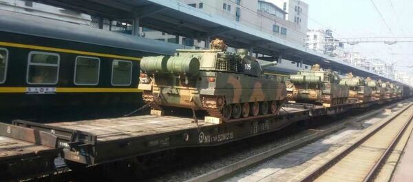 Photos of a light tank reportedly heading to a base in Southern China Photos of a light tank reportedly heading to a base in Southern China - Sputnik International