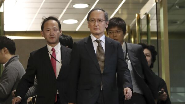Japanese Ambassador to South Korea Yasumasa Nagamine, center, leaves after a meeting at the Foreign Ministry in Seoul, South Korea, Friday, Jan. 6, 2017 - Sputnik International