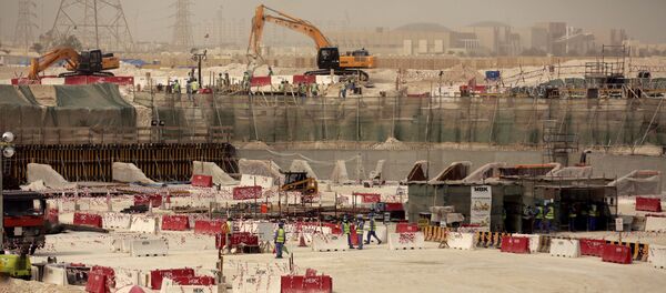 Laborers work at the Al-Wakra Stadium that is under construction for the 2022 World Cup, in Doha, Qatar (File) Laborers work at the Al-Wakra Stadium that is under construction for the 2022 World Cup, in Doha, Qatar (File) - Sputnik International