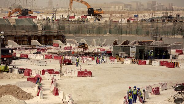 Laborers work at the Al-Wakra Stadium that is under construction for the 2022 World Cup, in Doha, Qatar (File) - Sputnik International