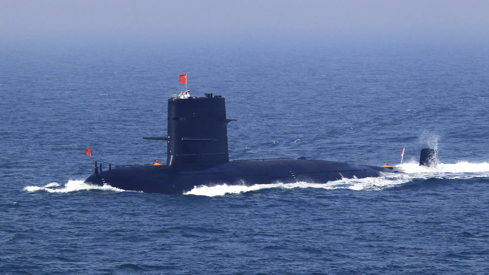In this April 26, 2012 file photo released by China's Xinhua News Agency, Chinese navy's submarine attends the fleet review of the China-Russia joint naval exercise in the Yellow Sea - Sputnik International, 1920, 15.05.2023