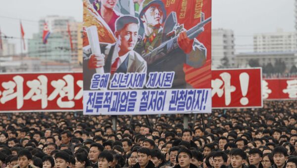 North Koreans gather during a mass rally to vow to carry through the tasks set forth by North Korean leader Kim Jong Un in his New Year's address, at Kim Il Sung Square in Pyongyang, North Korea Thursday, Jan. 5, 2017 - Sputnik International