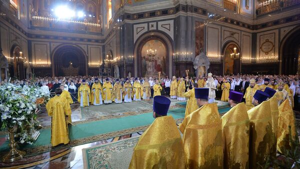 Patriarch Kirill of Moscow and All Russia during a solemn liturgy dedicated to the great feast of Nativity at the Cathedral of Christ the Savior in Moscow - Sputnik International