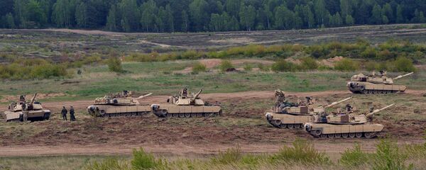 US troops with Abrams tanks. Poland (File) US troops with Abrams tanks. Poland (File) - Sputnik International