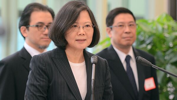Taiwan's President Tsai Ing-wen delivers a speech before traveling to visit Central American allies including a U.S. transit, Saturday, Jan. 7, 2017, at the Taoyuan International Airport in Taouyuan, Taiwan. Tsai pledged to bolster Taiwan's presence on the international stage on her visit four Central American allies on a trip that includes U.S. transits and looks set to raise China's ire. - Sputnik International