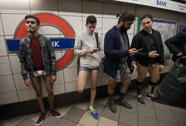 Londoners strip down to underwear for annual no-trousers tube ride 