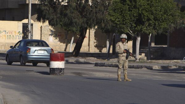 An Egyptian soldier mans a checkpoint in el-Arish, 290 kilometers (180 miles) east of Cairo, North Sinai, Egypt, Saturday, Jan. 31, 2015. - Sputnik International