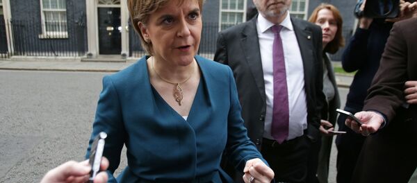 Scottish First Minister Nicola Sturgeon gestures as she speaks to members of the media outside 10 Downing Street in central London on October 24, 2016 after holding talks with British Prime Minister Theresa May and the first ministers of Wales and Northern Ireland on the government's Brexit plans. Sturgeon, leader of the secessionist Scottish National Party, - Sputnik International