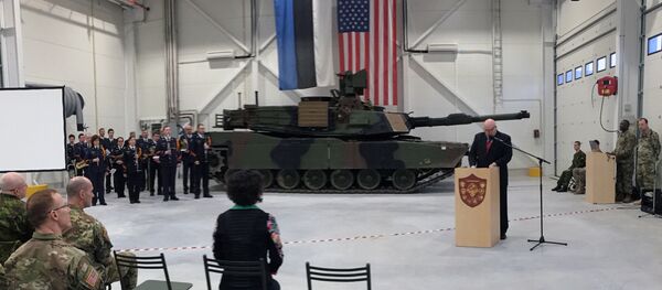 U.S. Ambassador to Estonia James D. Melville Jr. addresses dignitaries in front of an U.S. Army tank, at a hand-over ceremony of the upgraded NATO military base in Tapa, Estonia, Thursday, Dec. 15, 2016 U.S. Ambassador to Estonia James D. Melville Jr. addresses dignitaries in front of an U.S. Army tank, at a hand-over ceremony of the upgraded NATO military base in Tapa, Estonia, Thursday, Dec. 15, 2016 - Sputnik International