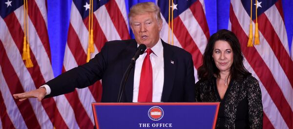 US President-elect Donald Trump gives a press conference with his Attorney Sheri Dillon (R) January 11, 2017 in New York - Sputnik International