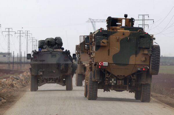 Turkish military vehicles drive in the Syrian rebel-held town of al-Rai, as they head towards the northern Syrian town of al-Bab, Syria January 4, 2017 Turkish military vehicles drive in the Syrian rebel-held town of al-Rai, as they head towards the northern Syrian town of al-Bab, Syria January 4, 2017 - Sputnik International