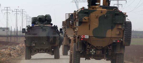 Turkish military vehicles drive in the Syrian rebel-held town of al-Rai, as they head towards the northern Syrian town of al-Bab, Syria January 4, 2017 Turkish military vehicles drive in the Syrian rebel-held town of al-Rai, as they head towards the northern Syrian town of al-Bab, Syria January 4, 2017 - Sputnik International