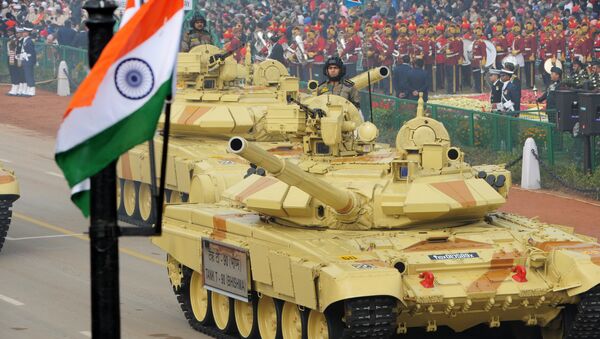 Indian military personnel drive Indian Army tanks as they take part in the Republic Day parade in New Delhi on January 26, 2014 - Sputnik International