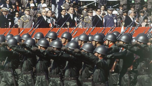 Japan’s ground self-defense forces military parade goes past a reviewing stand during the defense force’s annual parade in Asaka, Saitama prefecture, north of Tokyo, Oct. 30, 1983 - Sputnik International