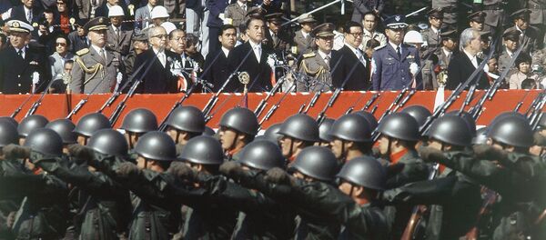 Japan’s ground self-defense forces military parade goes past a reviewing stand during the defense force’s annual parade in Asaka, Saitama prefecture, north of Tokyo, Oct. 30, 1983 Japan’s ground self-defense forces military parade goes past a reviewing stand during the defense force’s annual parade in Asaka, Saitama prefecture, north of Tokyo, Oct. 30, 1983 - Sputnik International