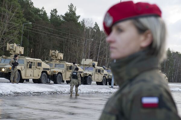 American soldiers are pictured during a welcome ceremony at the Polish-German border in Olszyna, Poland on January 12, 2017 - Sputnik International