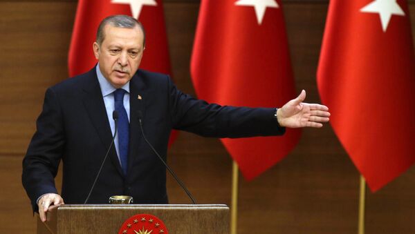 Turkish President Recep Tayyip Erdogan delivers a speech during the 31st Mukhtars (local administrators) meeting at Presidential Complex in Ankara on December 7, 2016.  - Sputnik International