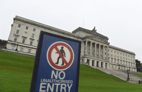 The Parliament Buildings at Stormont are seen behind a no entry sign, a day after deputy first minister Martin McGuinness resigned, throwing the devolved joint administration into crisis, in Belfast Northern Ireland, January 10, 2017. The Parliament Buildings at Stormont are seen behind a no entry sign, a day after deputy first minister Martin McGuinness resigned, throwing the devolved joint administration into crisis, in Belfast Northern Ireland, January 10, 2017. - Sputnik International