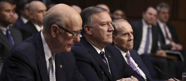 CIA Director-designate Rep. Michael Pompeo, R-Kan., center, flanked by former Senate Majority Leader Bob Dole, right, and Sen. Pat Roberts, R-Kan., listens on Capitol Hill in Washington, Thursday, Jan. 12, 2017, at his confirmation hearing before the Senate Intelligence Committee CIA Director-designate Rep. Michael Pompeo, R-Kan., center, flanked by former Senate Majority Leader Bob Dole, right, and Sen. Pat Roberts, R-Kan., listens on Capitol Hill in Washington, Thursday, Jan. 12, 2017, at his confirmation hearing before the Senate Intelligence Committee - Sputnik International