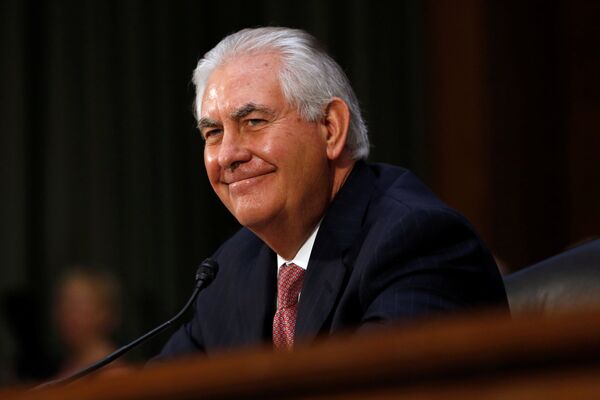 Rex Tillerson, the former chairman and chief executive officer of Exxon Mobil, smiles during his testimony before a Senate Foreign Relations Committee confirmation hearing on his nomination to be U.S. secretary of state in Washington, U.S. January 11, 2017 Rex Tillerson, the former chairman and chief executive officer of Exxon Mobil, smiles during his testimony before a Senate Foreign Relations Committee confirmation hearing on his nomination to be U.S. secretary of state in Washington, U.S. January 11, 2017 - Sputnik International